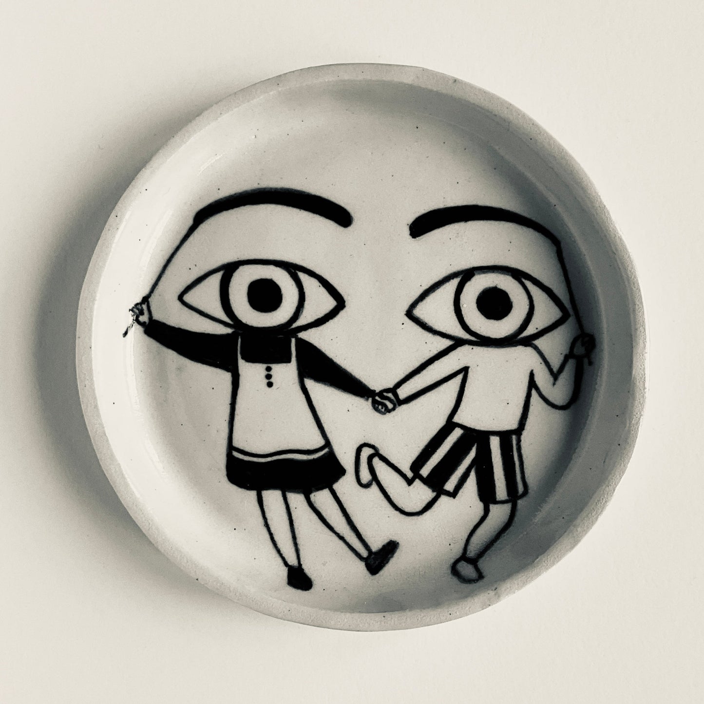 Friends dressed as Eyes plate
