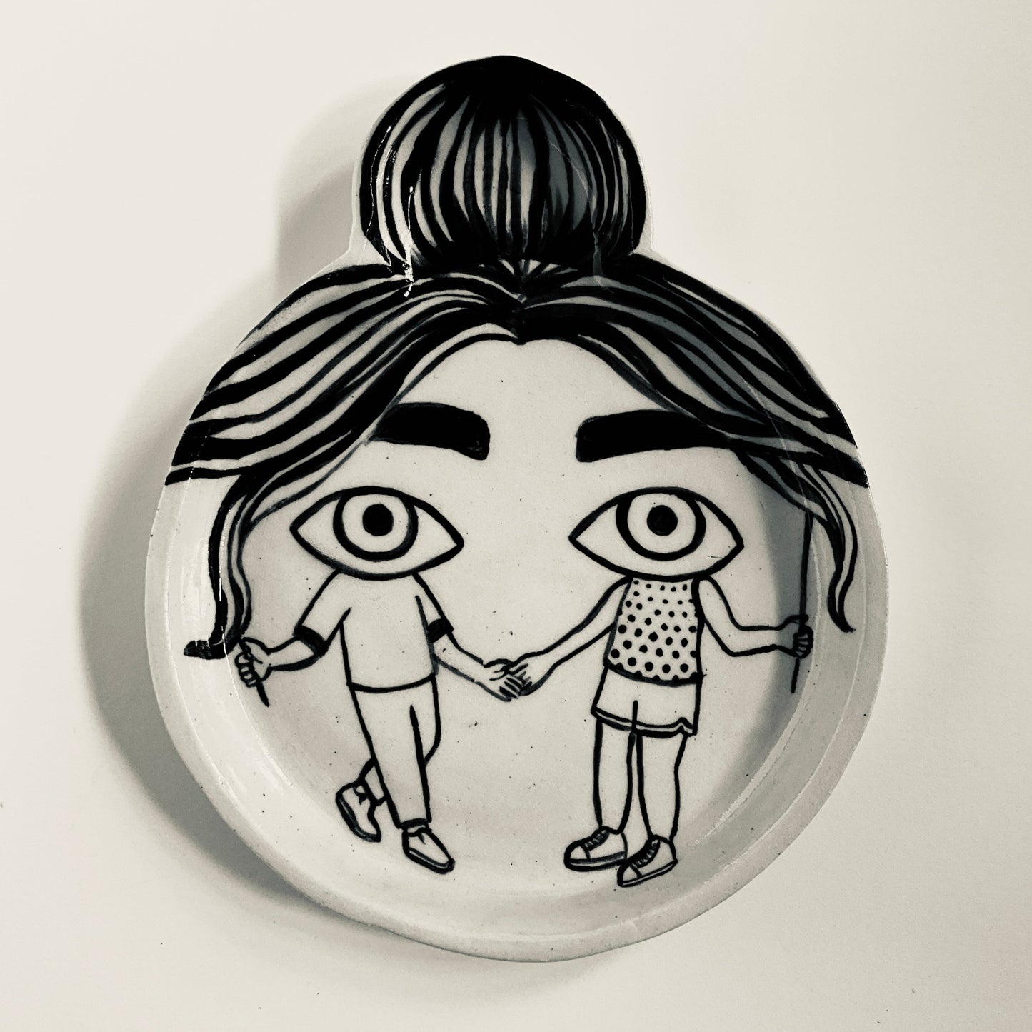 Friends dressed as Eyes and Hair plate