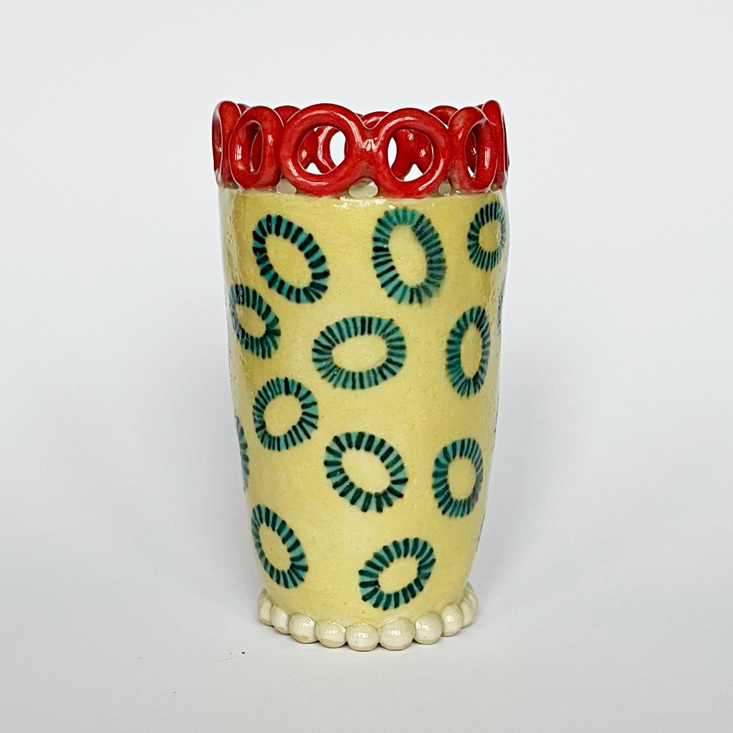 Honey Dew Yellow with Turquoise Lozenges and a Red Ring Crown