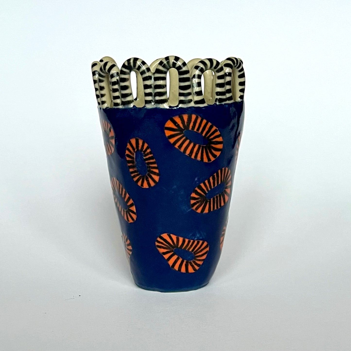 Blue with Painted Orange Lozenges and a Stripy Looped Crown