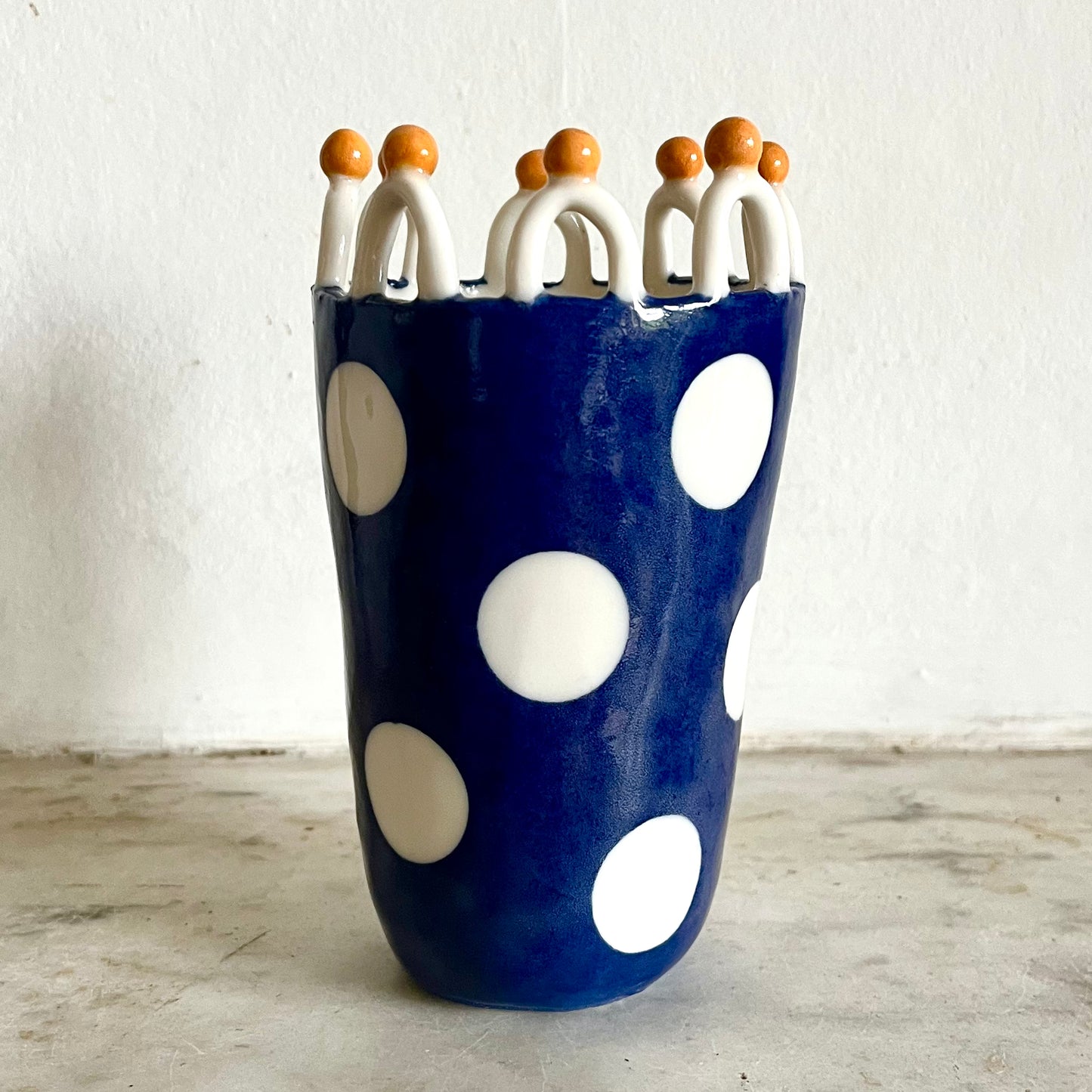 Porcelain Lady with Large White Dots on Blue