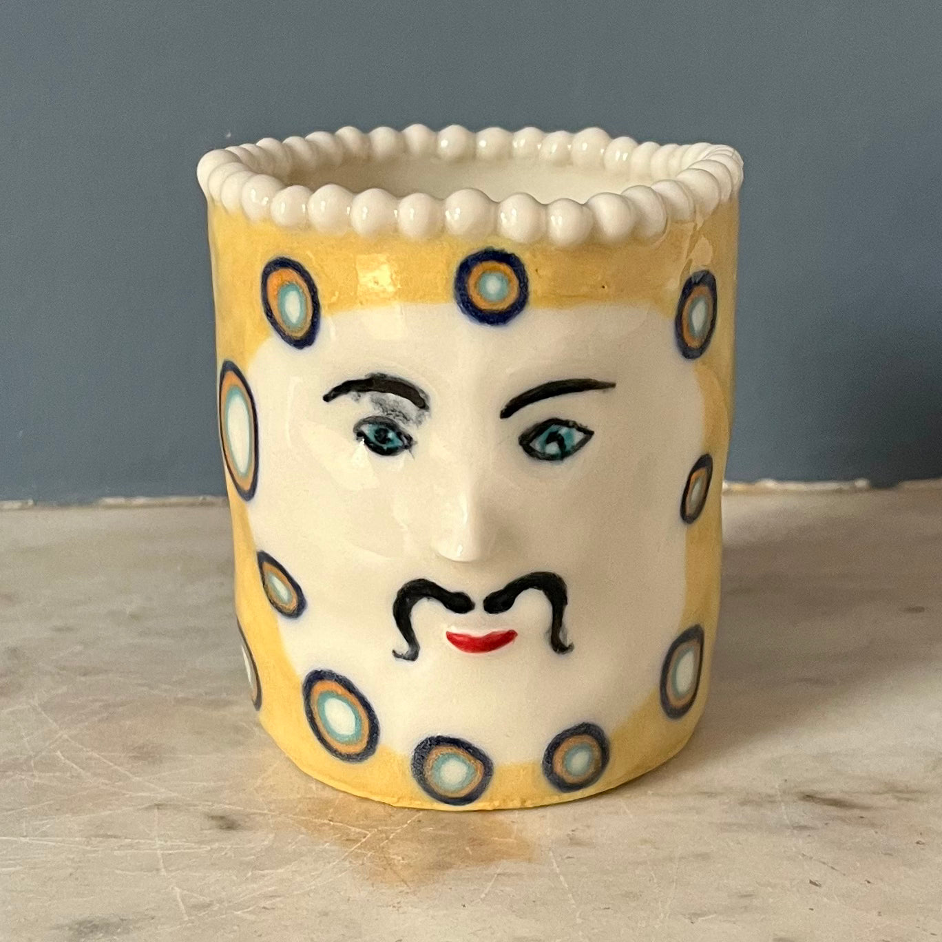 Honeydew Yellow with White Spots, Moustache and a Pearly Topped Crown