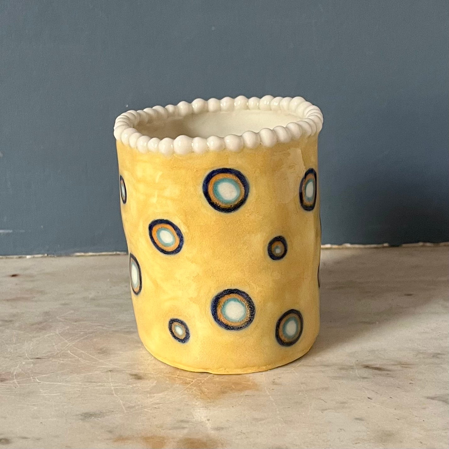 Honeydew Yellow with White Spots, Moustache and a Pearly Topped Crown