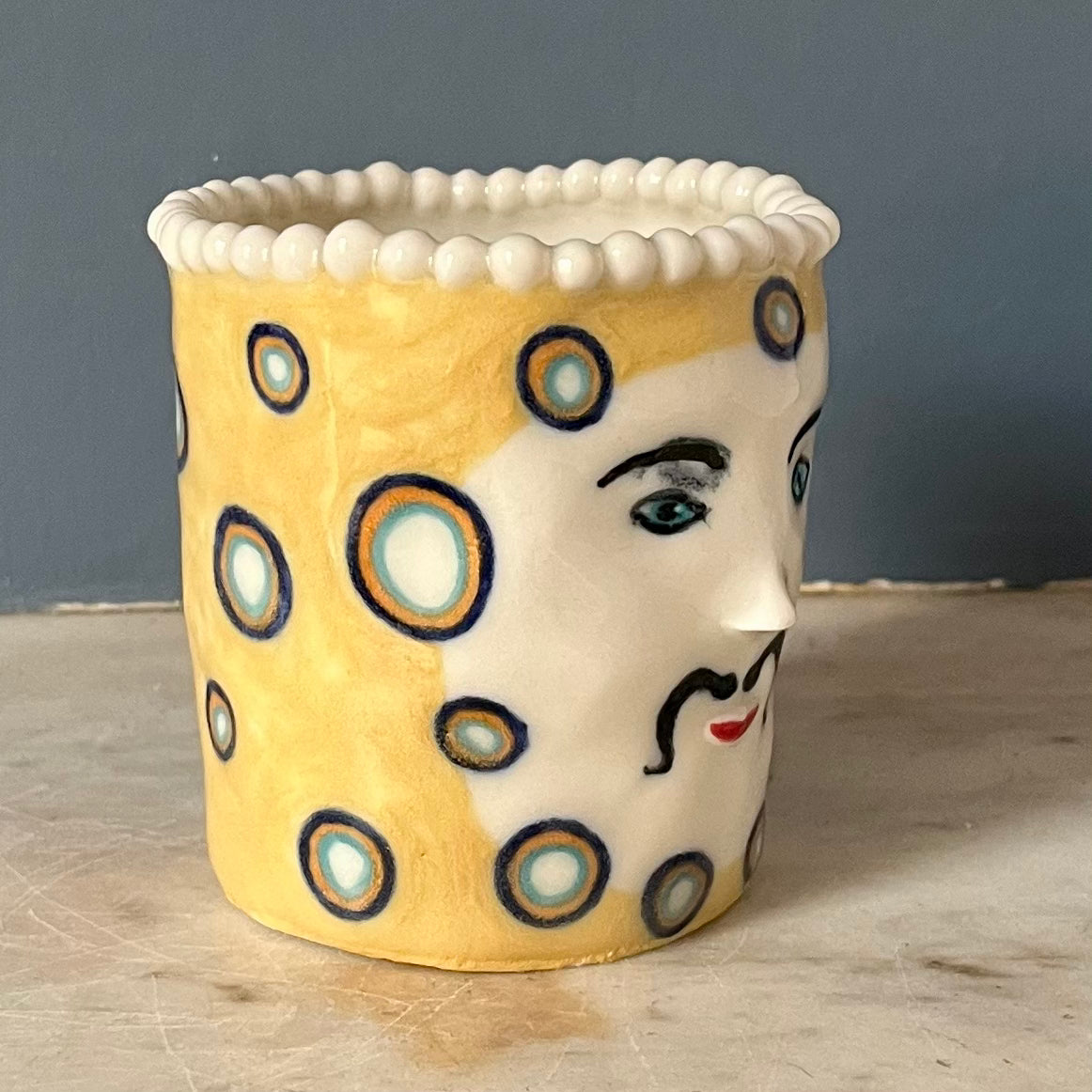 Honeydew Yellow with White Spots, Moustache and a Pearly Topped Crown