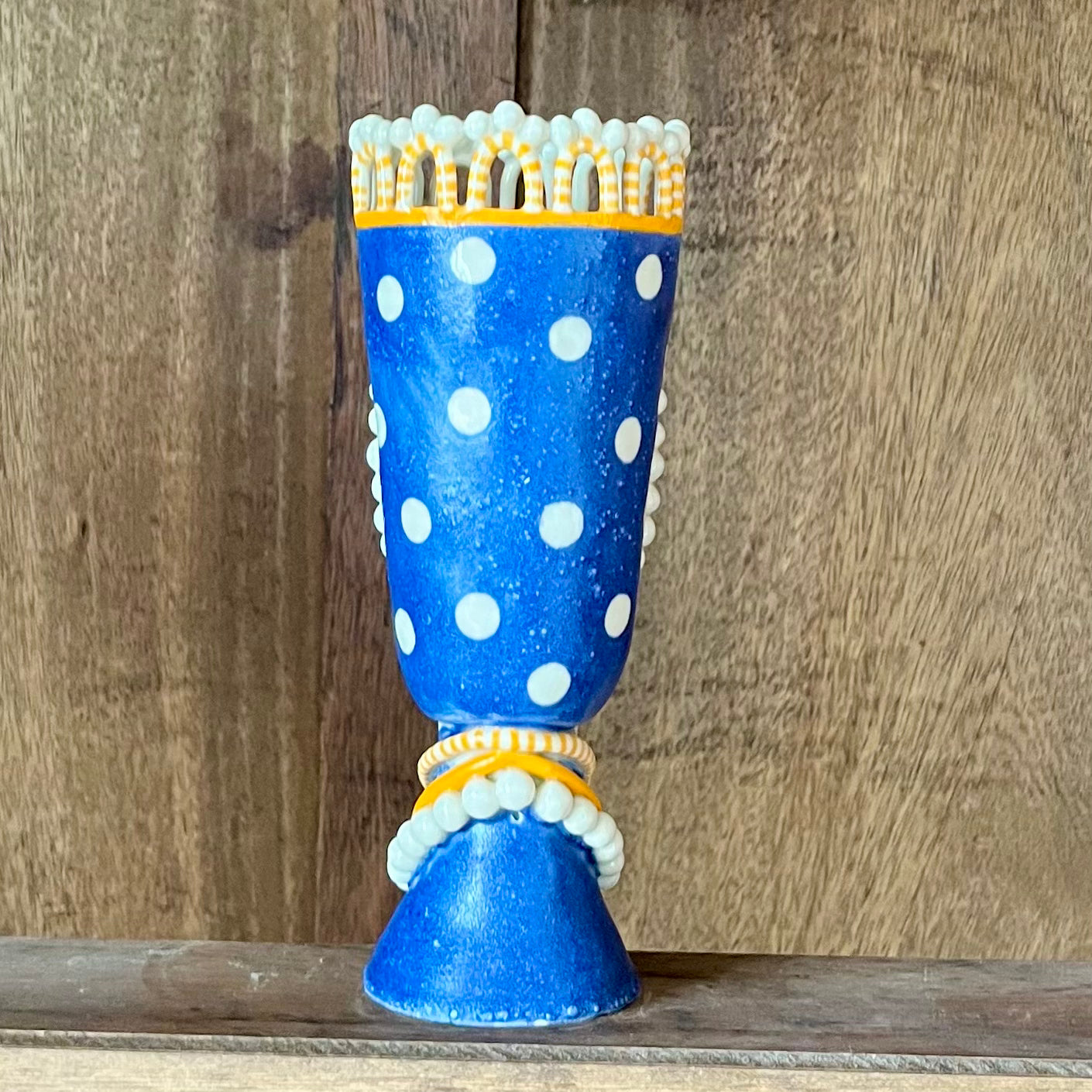 Tall Pearly Hood and Crown Lady on White Spotted Blue.