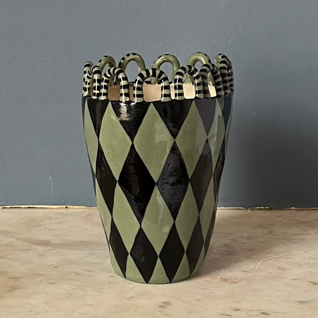 Green and Black Harlequin Man