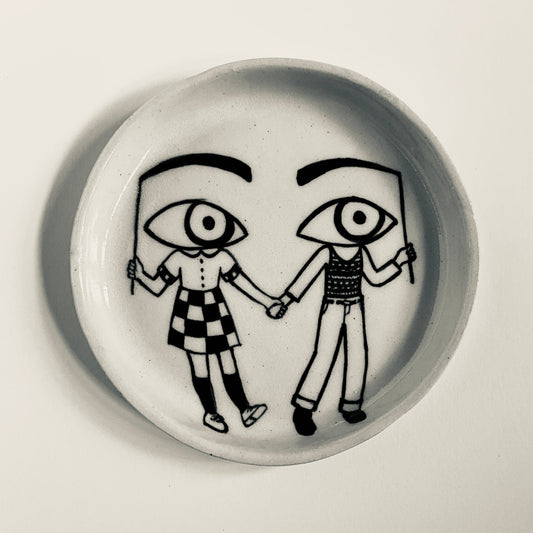 Friends dressed as Curious Eyes plate