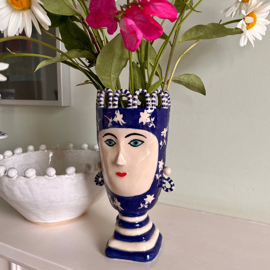 White Flowers on Blue Tall Lady with Stripy Hooped Crown and Looped Earrings