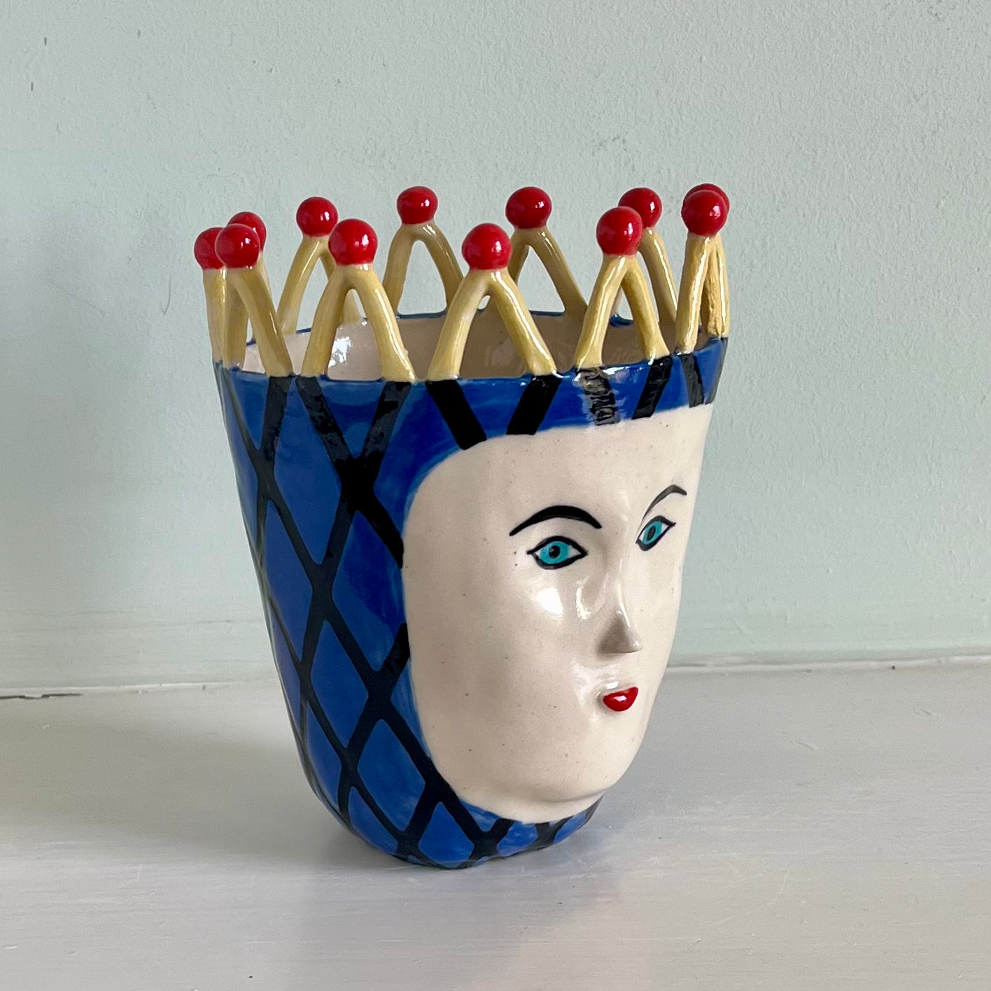 Black Trellis on Blue with Matchstick Crown