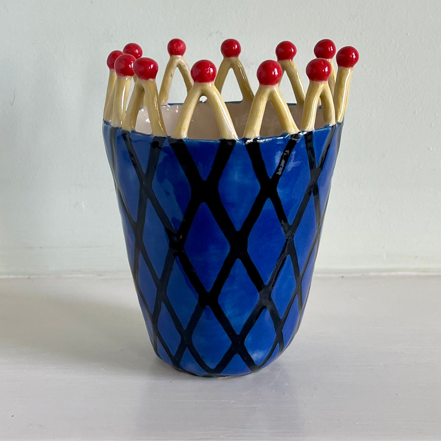 Black Trellis on Blue with Matchstick Crown