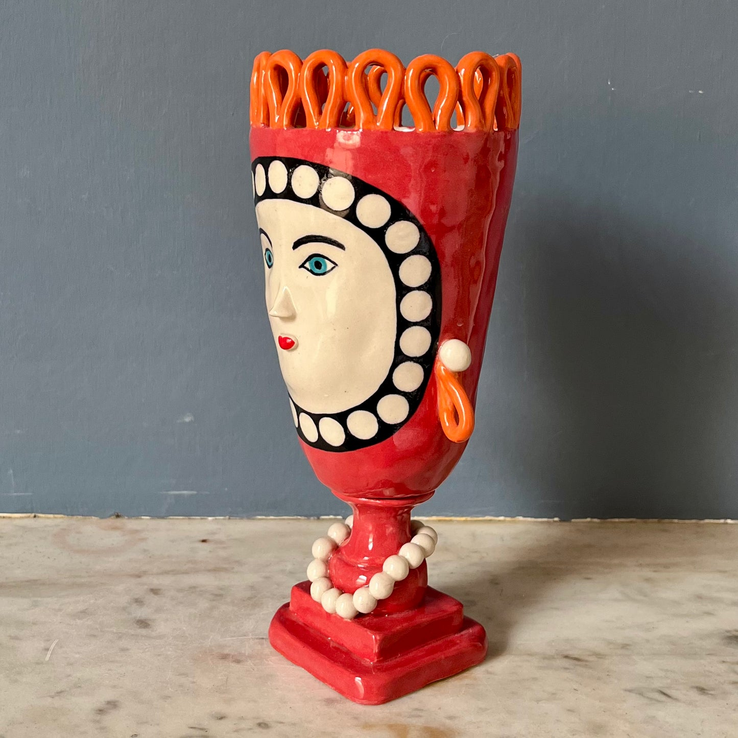 Red Tall Vase Lady with Pearl Necklace and Orange Crown