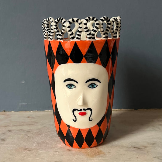 Orange and Black Harlequin Man