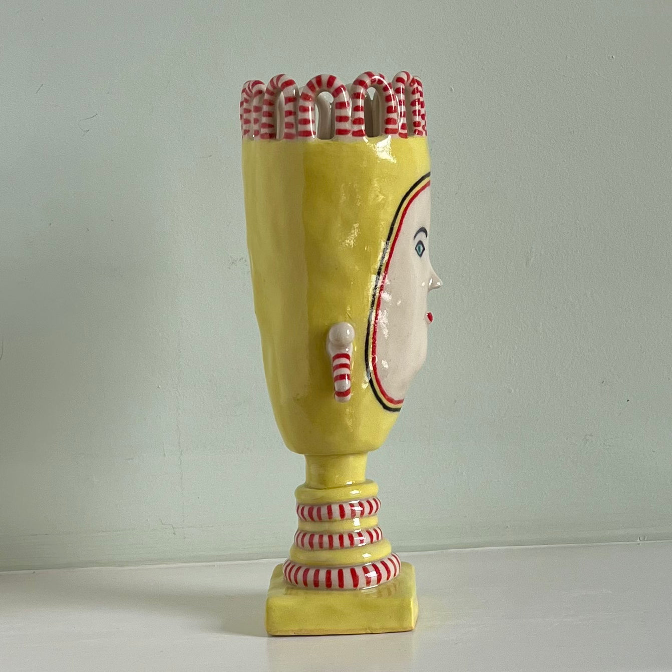 Yellow Tall Lady with Stripy Looped Crown and Droplet Earrings