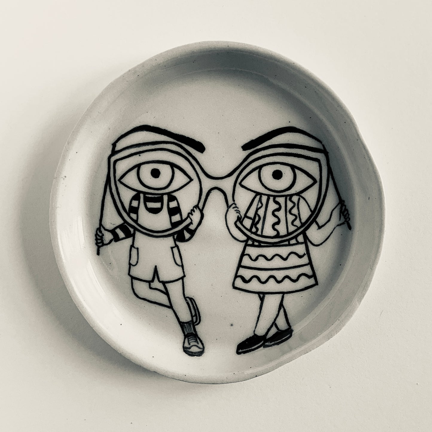 Friends Dressed as Eyes and Glasses with Stern Brows plate