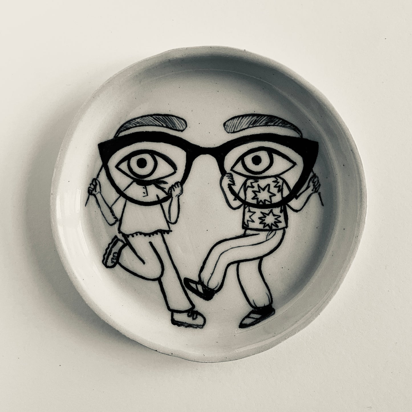 Friends Dressed as Eyes and Glasses do a Dance plate
