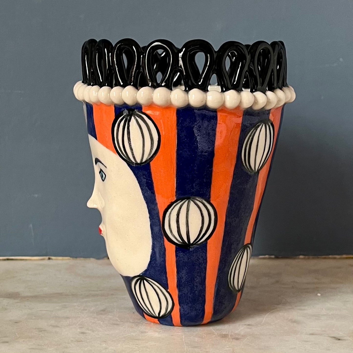 Black Droplet Crown with Painted Baubles on Orange and Blue Stripes