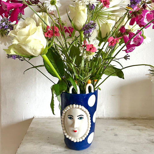 Porcelain Lady with Large White Dots on Blue