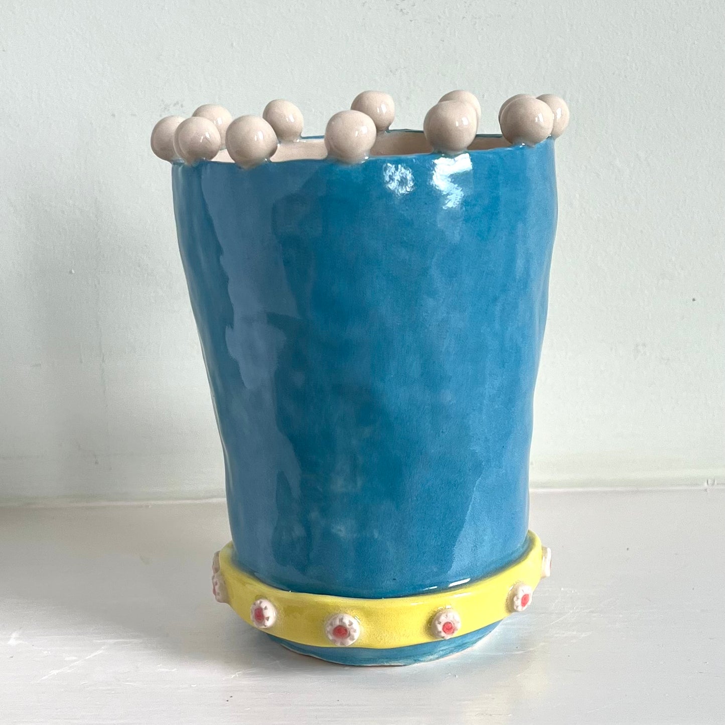 Poodle in Turquoise Balaclava with Yellow Jewelled Collar