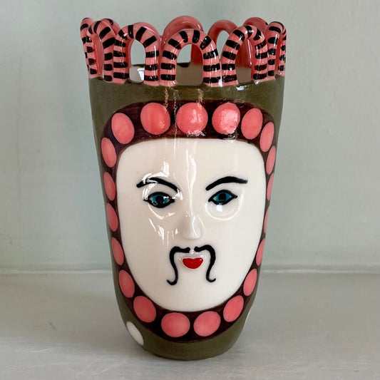 Green Man with Pink and Chocolate Brown Surround, and White Spots