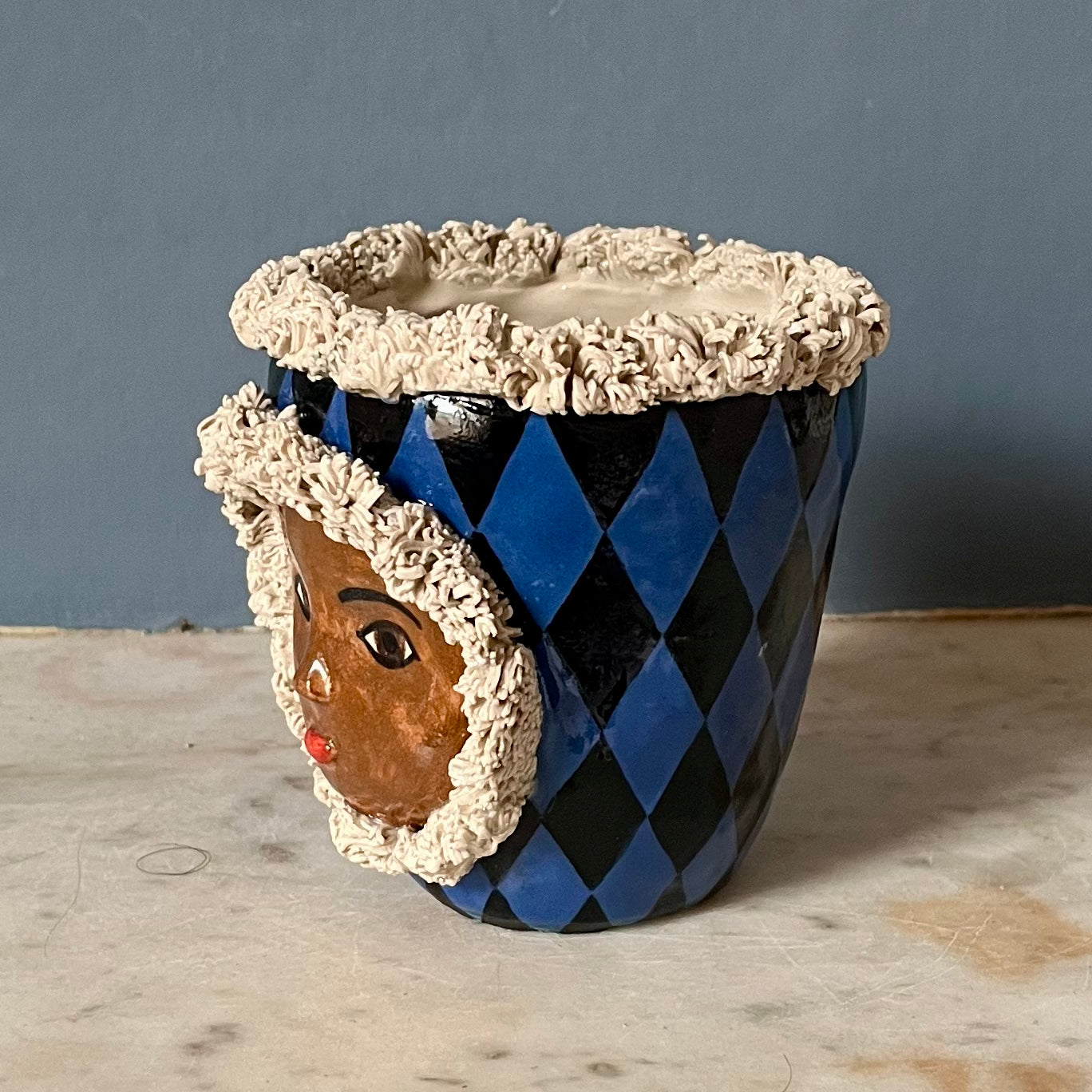 Blue and Black Harlequin with Fur Hood and Crown