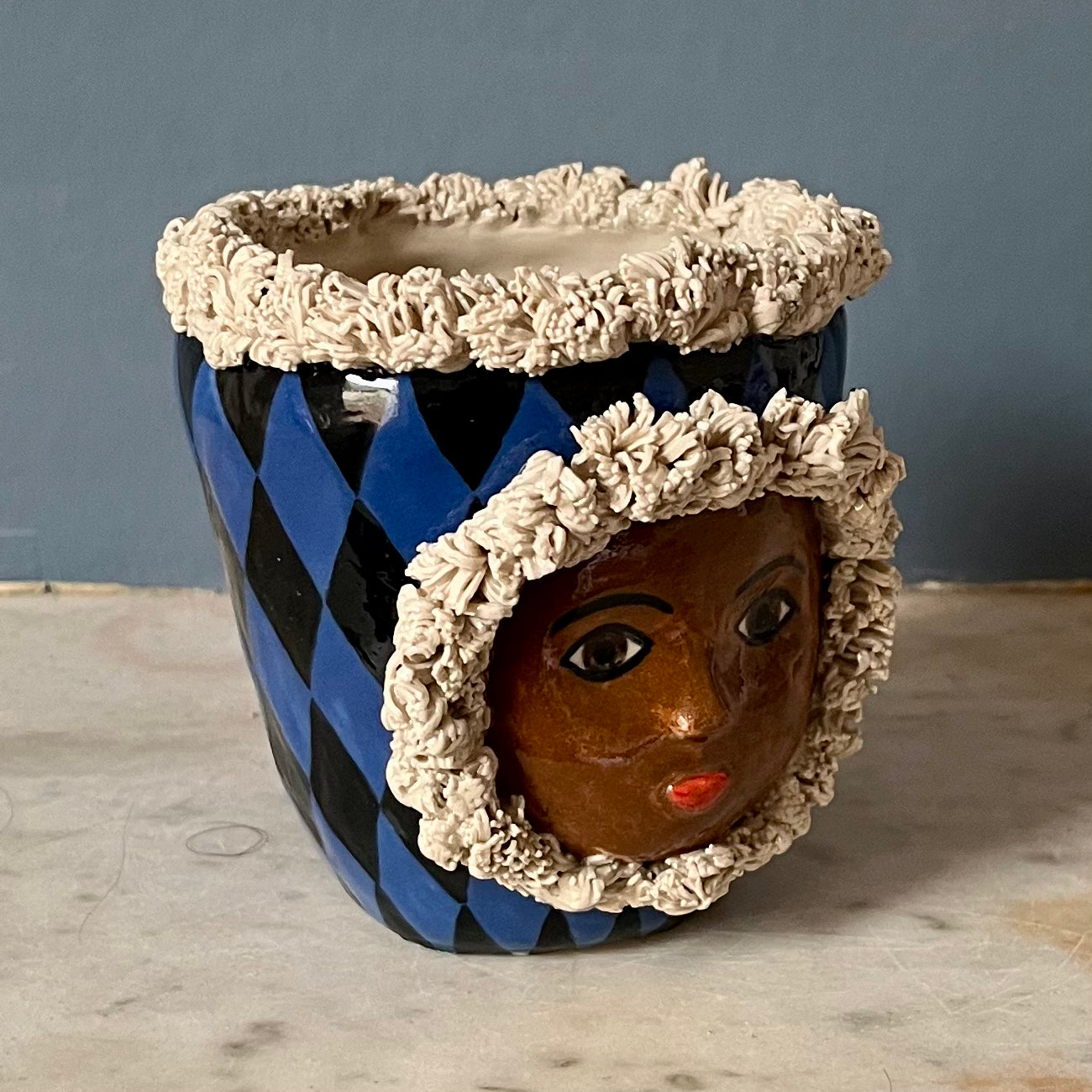 Blue and Black Harlequin with Fur Hood and Crown