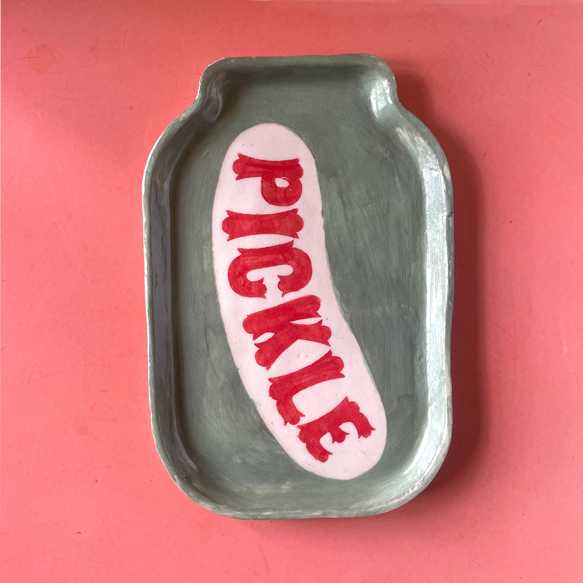 Pickle Dish on a red background