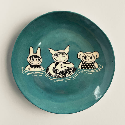 Water Babies Bobbing in Muted Blue Sea plate
